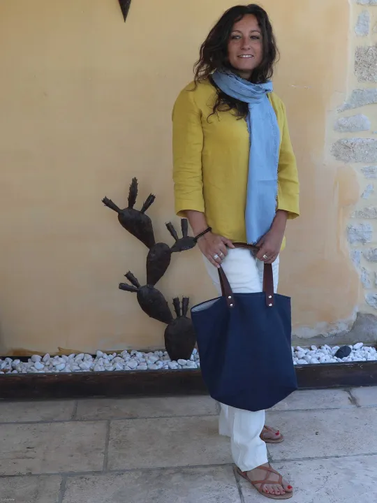 Navy linen tote bag worn