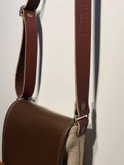 Linen silver grey shoulder bag with a leather flap handles