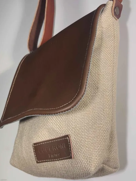 Linen silver grey shoulder bag with a leather flap down