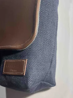 Linen navy shoulder bag with a leather flap down