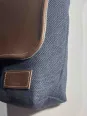 Linen navy shoulder bag with a leather flap down