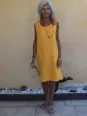 stylish mustard-coloured sleeveless linen dress