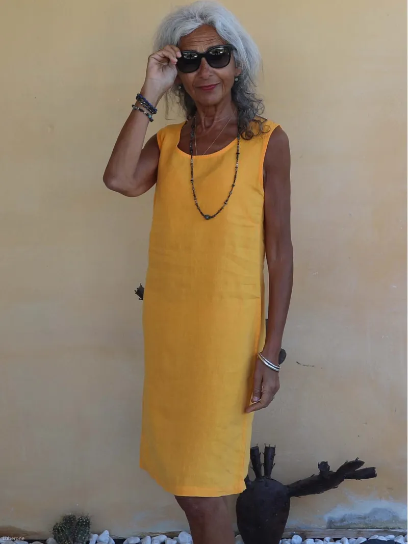 mustard-coloured sleeveless linen dress (detail)