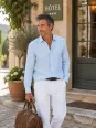 Men's sky blue linen long sleeve shirt on a Provençal lifestyle