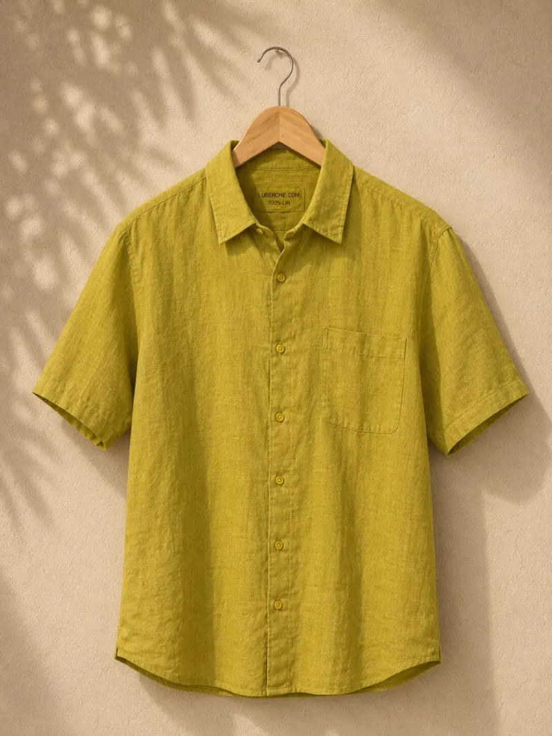 Men's mustard yellow linen short sleeve shirt with collar on hanger