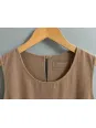Close-up of the round neckline and label on the women's coffee linen Lourmarin dress
