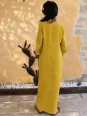Back view of the women's long yellow linen dress with V-neck and long sleeves Rustrel