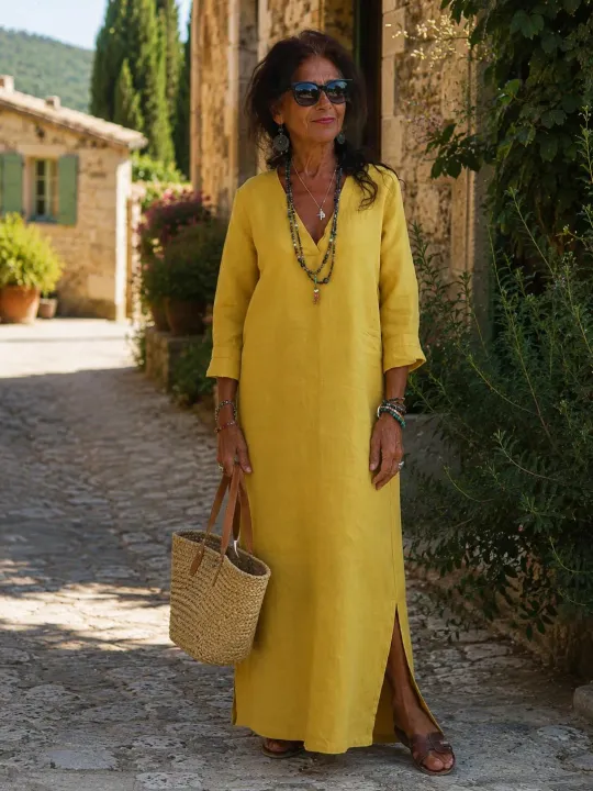 Women's long yellow linen dress with V-neck and long sleeves Rustrel worn in the Luberon