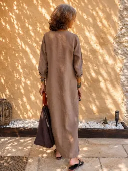 Back view of the women's long coffee linen dress with V-neck and long sleeves Rustrel