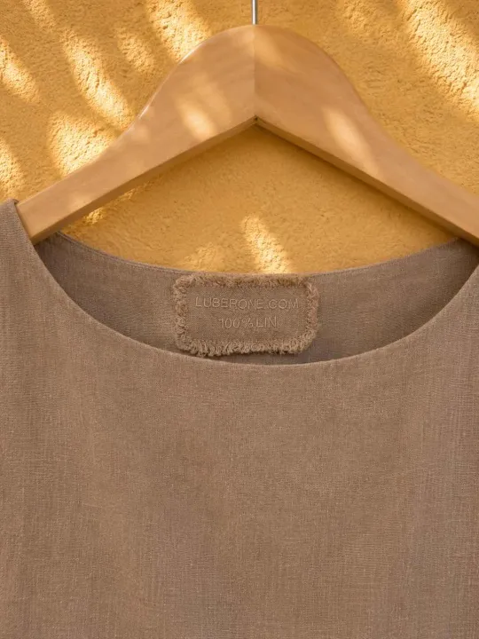 Embroidered collar and label of the women's coffee brown linen top Lauris
