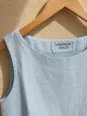 Collar and label of the women's sky blue sleeveless linen top Lauris