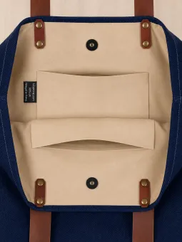 nterior of navy linen tote bag with magnetic closure and pockets