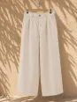 Pantalon en lin à pinces femme sable sur cintre