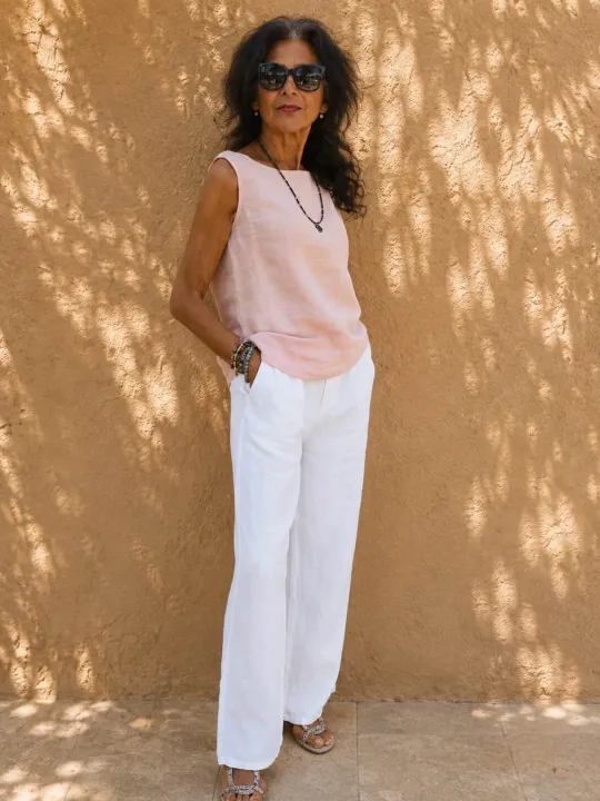 Women's white pleated linen trousers front view