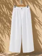 Pantalon en lin à pinces femme blanc sur cintre