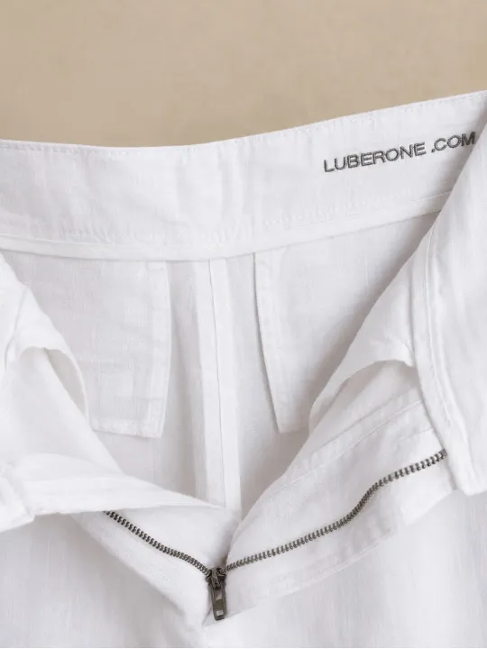 Détail de la fermeture du pantalon en lin à pinces femme blanc