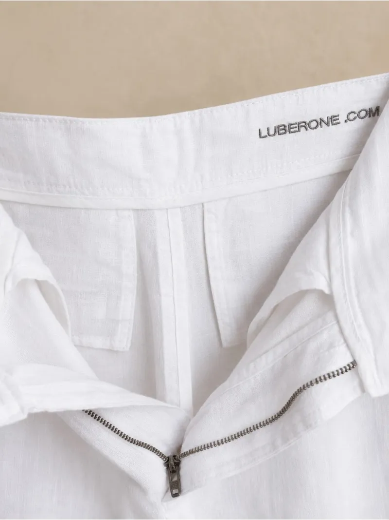 Détail de la fermeture du pantalon en lin à pinces femme blanc