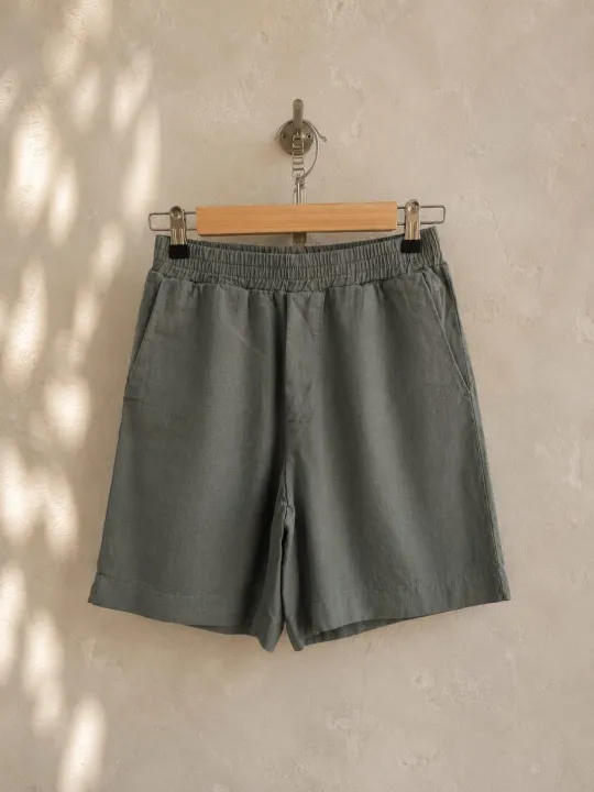 Women's khaki linen elastic waist bermuda shorts on hanger