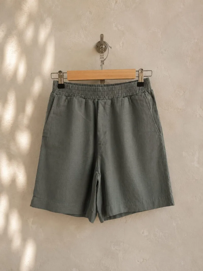 Women's khaki linen elastic waist bermuda shorts on hanger