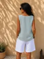 Women's white linen elastic waist bermuda shorts back view