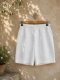 Women's white linen elastic waist bermuda shorts on hanger