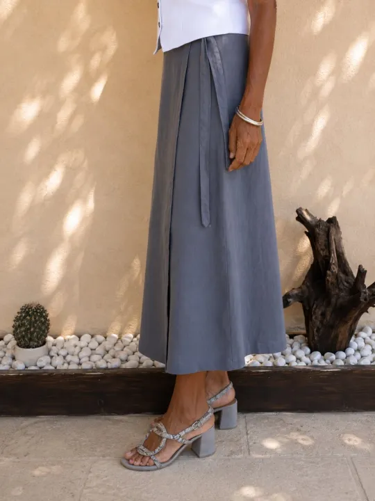 Side detail of the women's taupe linen wrap skirt