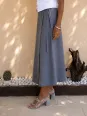 Side detail of the women's taupe linen wrap skirt
