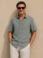 Sage green men's linen shirt with short sleeves Bonnieux front view