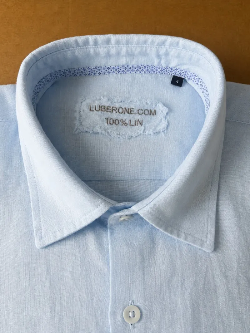 Collar and label of a sky blue men's linen shirt Bonnieux
