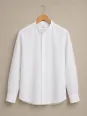 White collarless linen shirt for men Bonnieux on wooden hanger