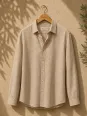 Men's beige linen shirt with long sleeves Bonnieux on wooden hanger