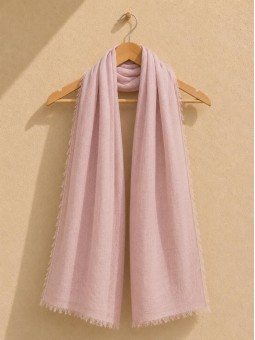 Pink 100% linen scarf hanging on a wooden hanger