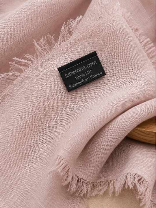 Close-up of the pink linen fabric and fringed edges