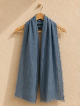 Green 100% linen scarf hanging on a wooden hanger