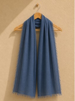 Navy 100% linen scarf hanging on a wooden hanger