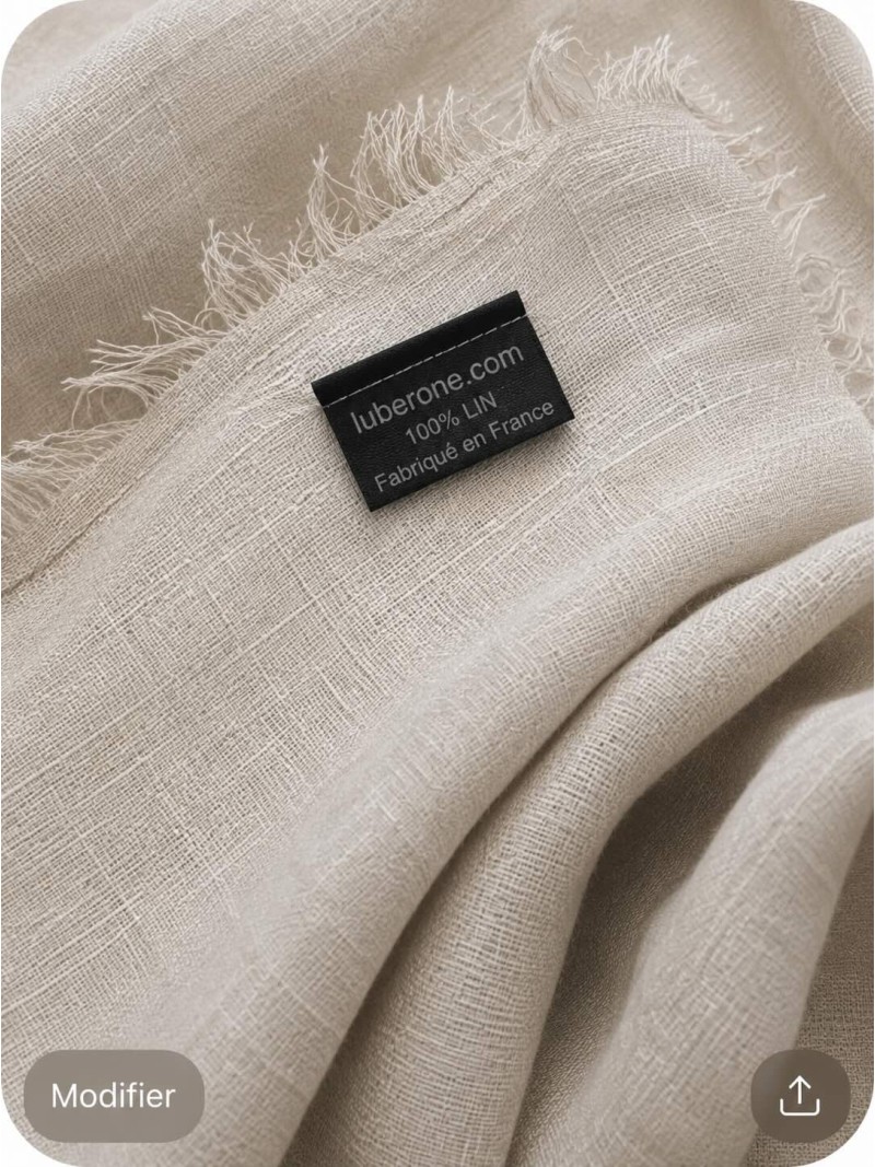 Close-up of the sand linen fabric and the ‘Made in France’ label