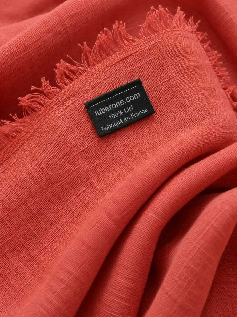 Close-up of the ocher linen fabric and the ‘Made in France' label