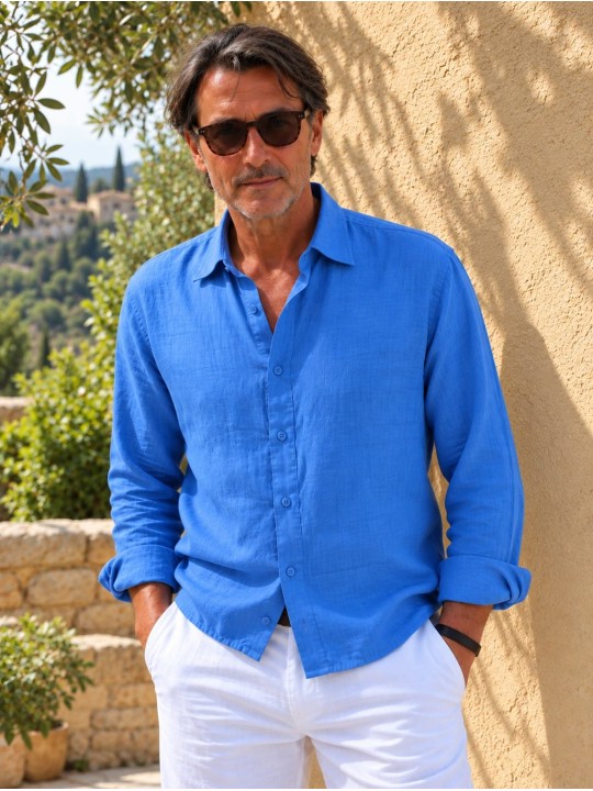 Man wearing a royal blue long-sleeved linen shirt in Provence, France