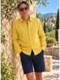 Man wearing a yellow long-sleeved linen shirt in the Luberon, Provence