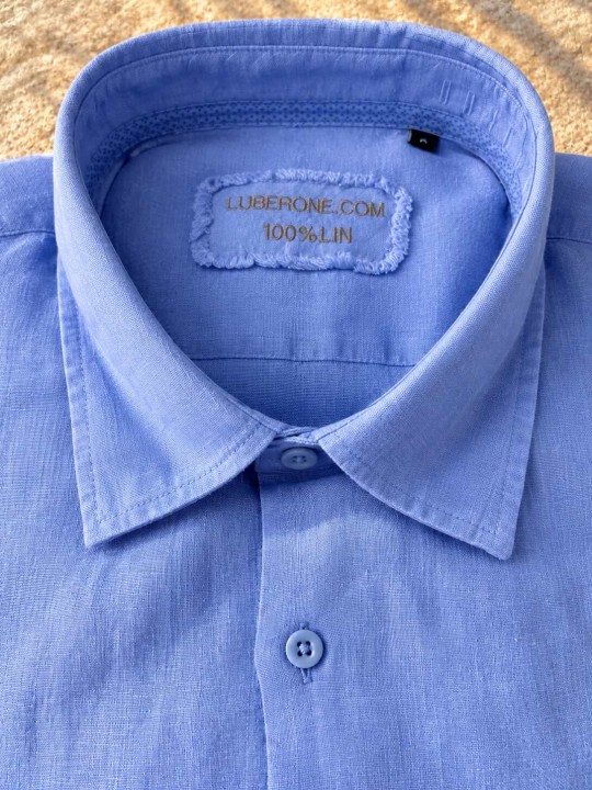 Collar and Luberone label detail of a lilac linen shirt