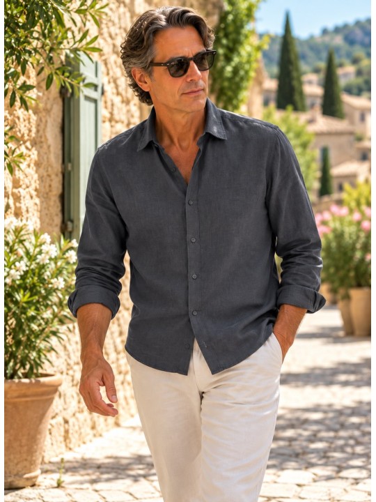 Man wearing an anthracite long-sleeved linen shirt in a village street in the Luberon, Provence
