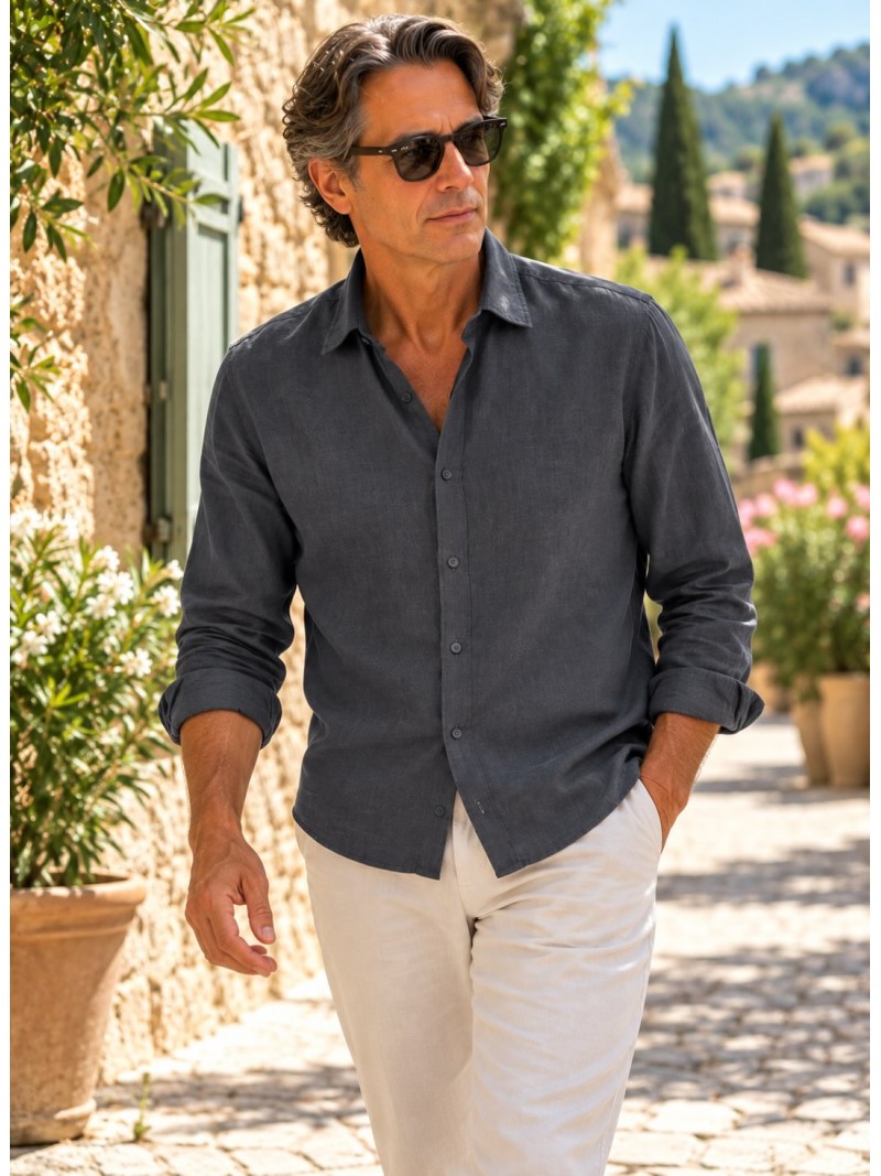 Man wearing an anthracite long-sleeved linen shirt in a village street in the Luberon, Provence